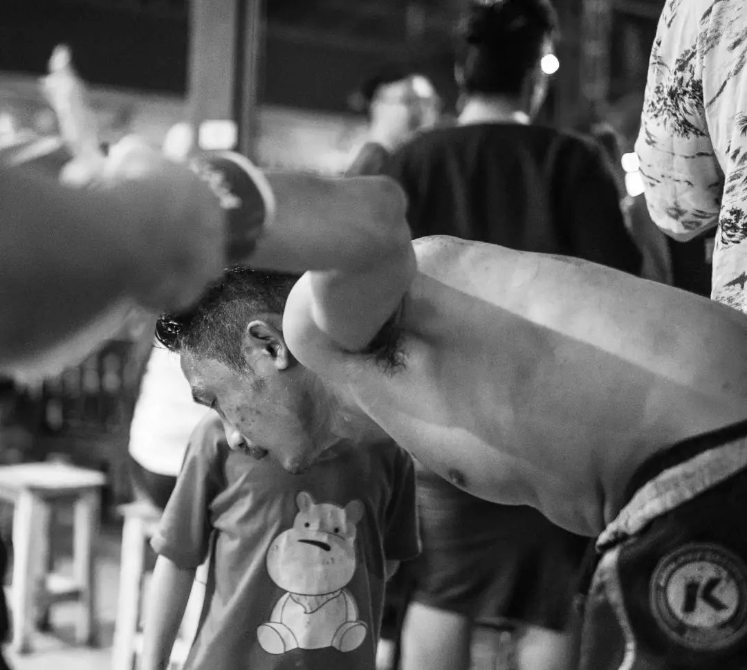 Dad and son muay thai fighters